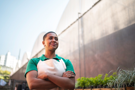 Female Smiling Outside Warehouse