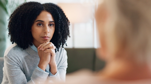 Business Woman Listening - Hands Folded